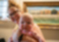 Women smiling with baby