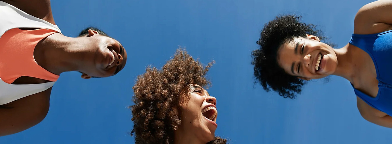 three women laughing